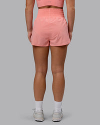 Woman wearing Power Train 2" Shorts - Murex Shell