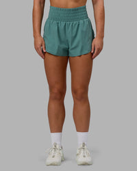 Woman wearing Power Train 2" Shorts - Sagebrush
