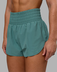 Woman wearing Power Train 2" Shorts - Sagebrush