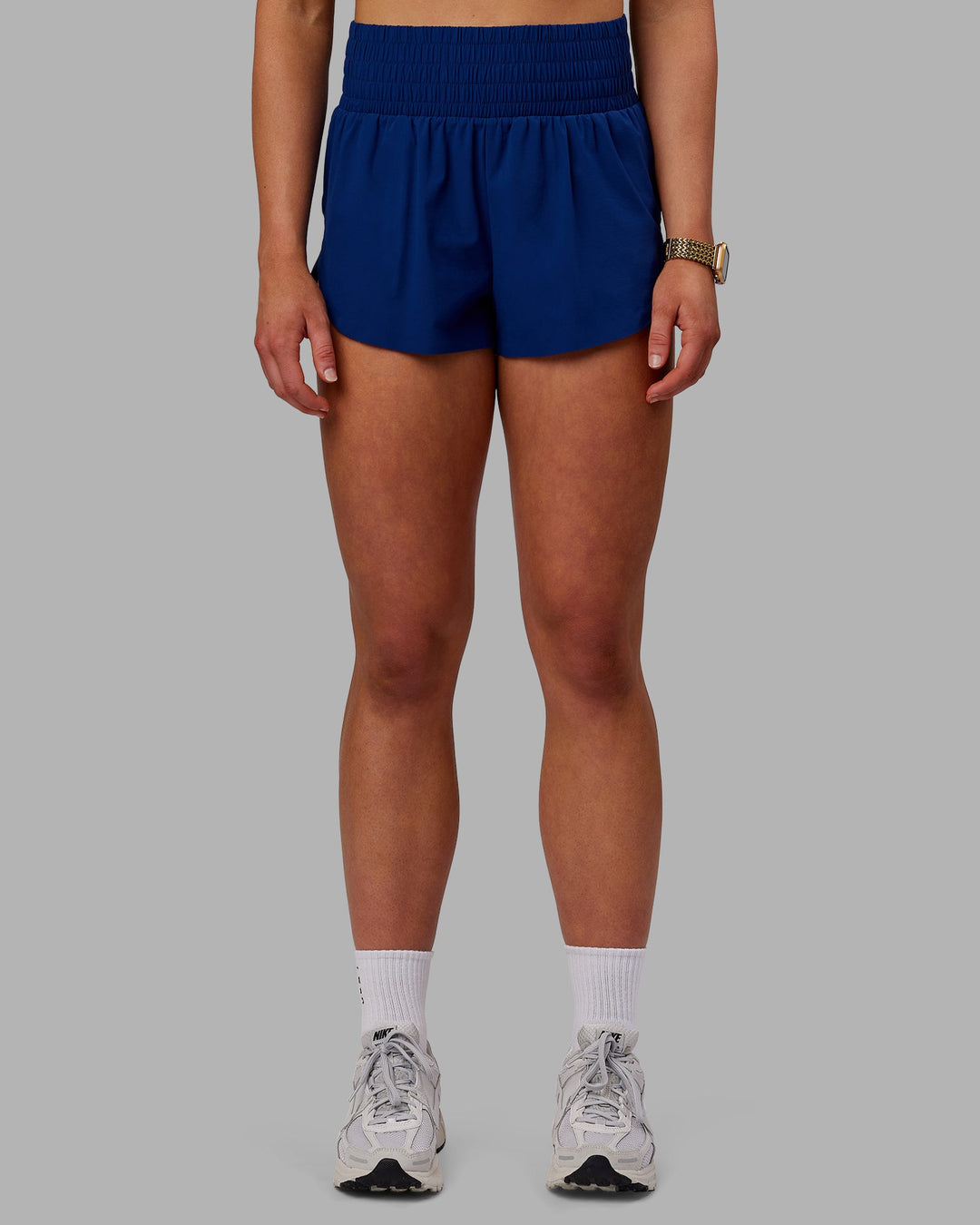 Woman wearing Power Train Shorts - Midnight Blue