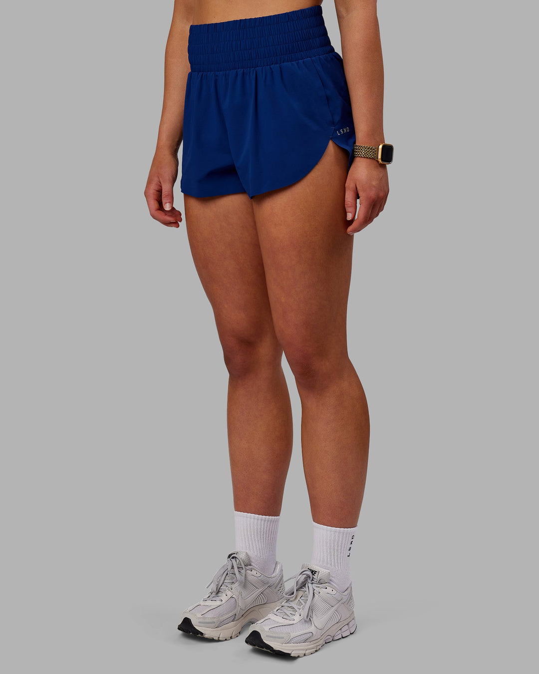 Woman wearing Power Train Shorts - Midnight Blue