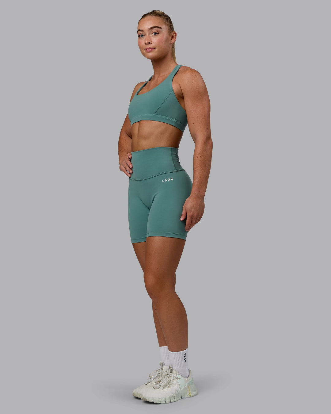 Woman wearing Precision Sports Bra - Sagebrush