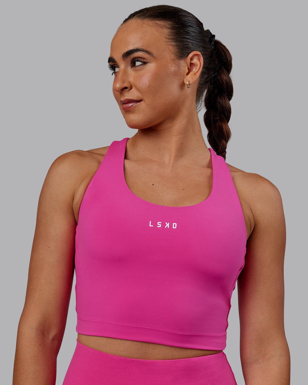 Woman wearing Pulse Active Tank - Fuchsia Pink