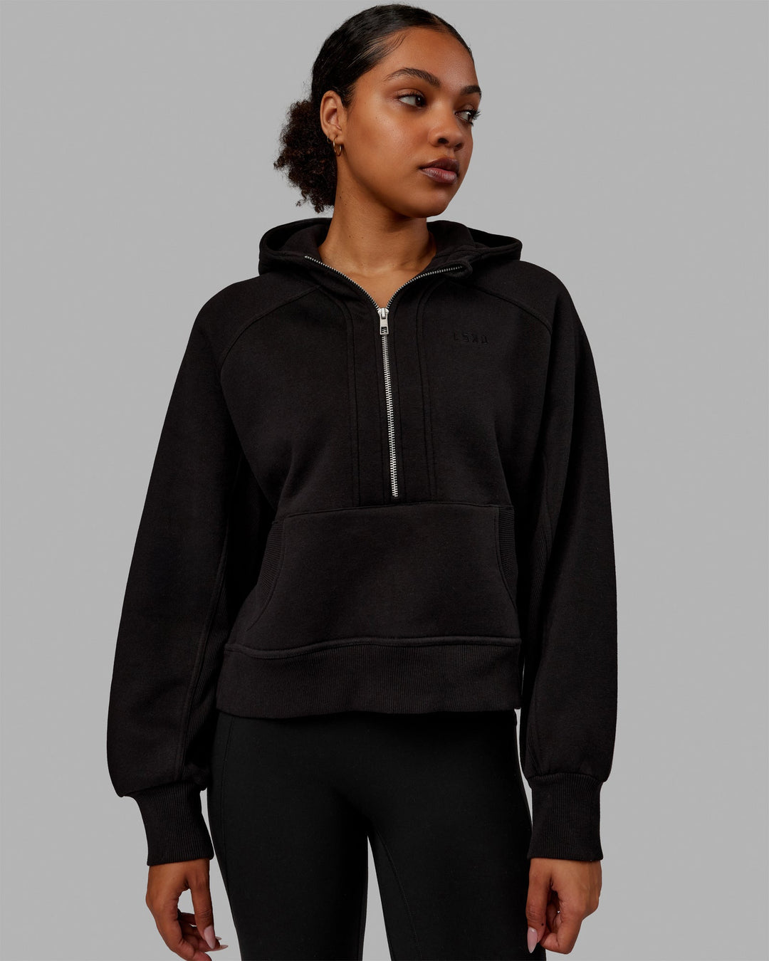 Woman wearing Pursue Hoodie - Black