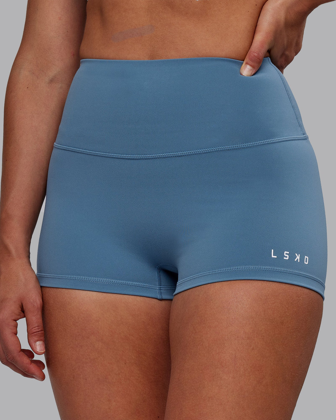 Woman wearing RXD High Waist Micro Shorts - Elemental Blue