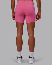 Woman wearing RXD Low-Rise 6" Short - Carmine Rose
