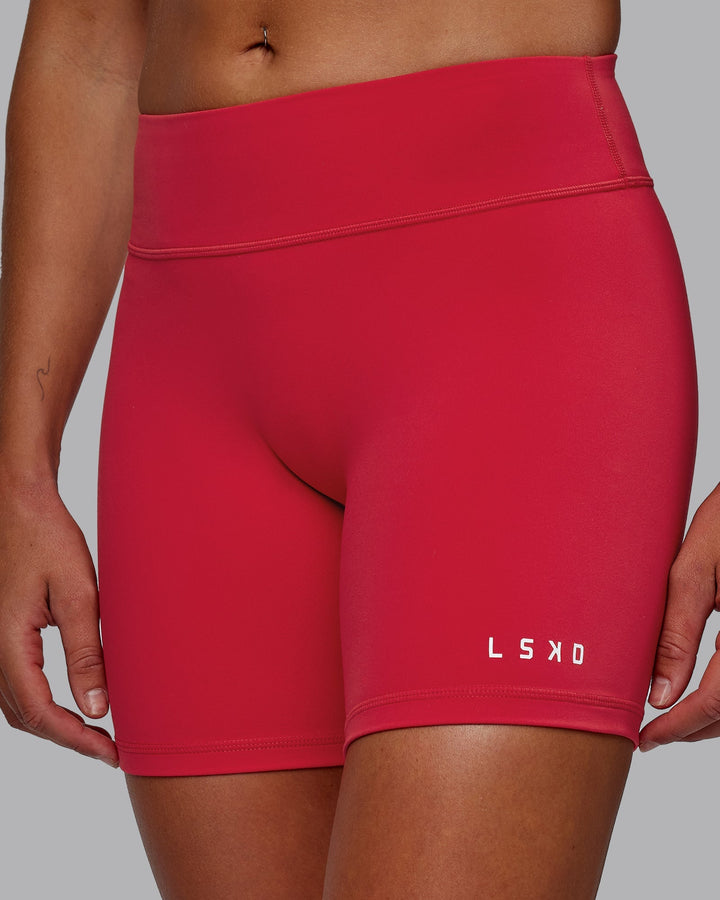 Woman wearing RXD Mid-Length Shorts - Scarlet
