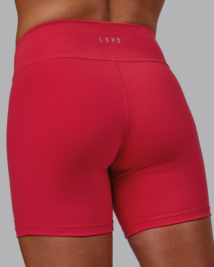 Woman wearing RXD Mid-Length Shorts - Scarlet
