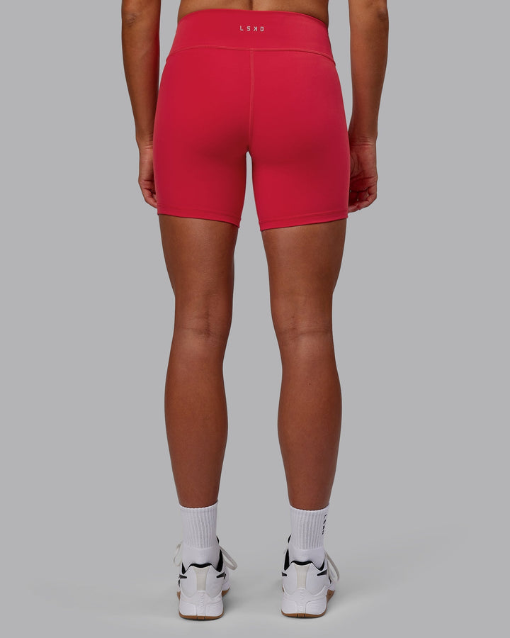 Woman wearing RXD Mid-Length Shorts - Scarlet
