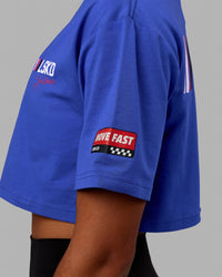 Woman wearing Redline FLXCotton Cropped Tee - Power Cobalt-White