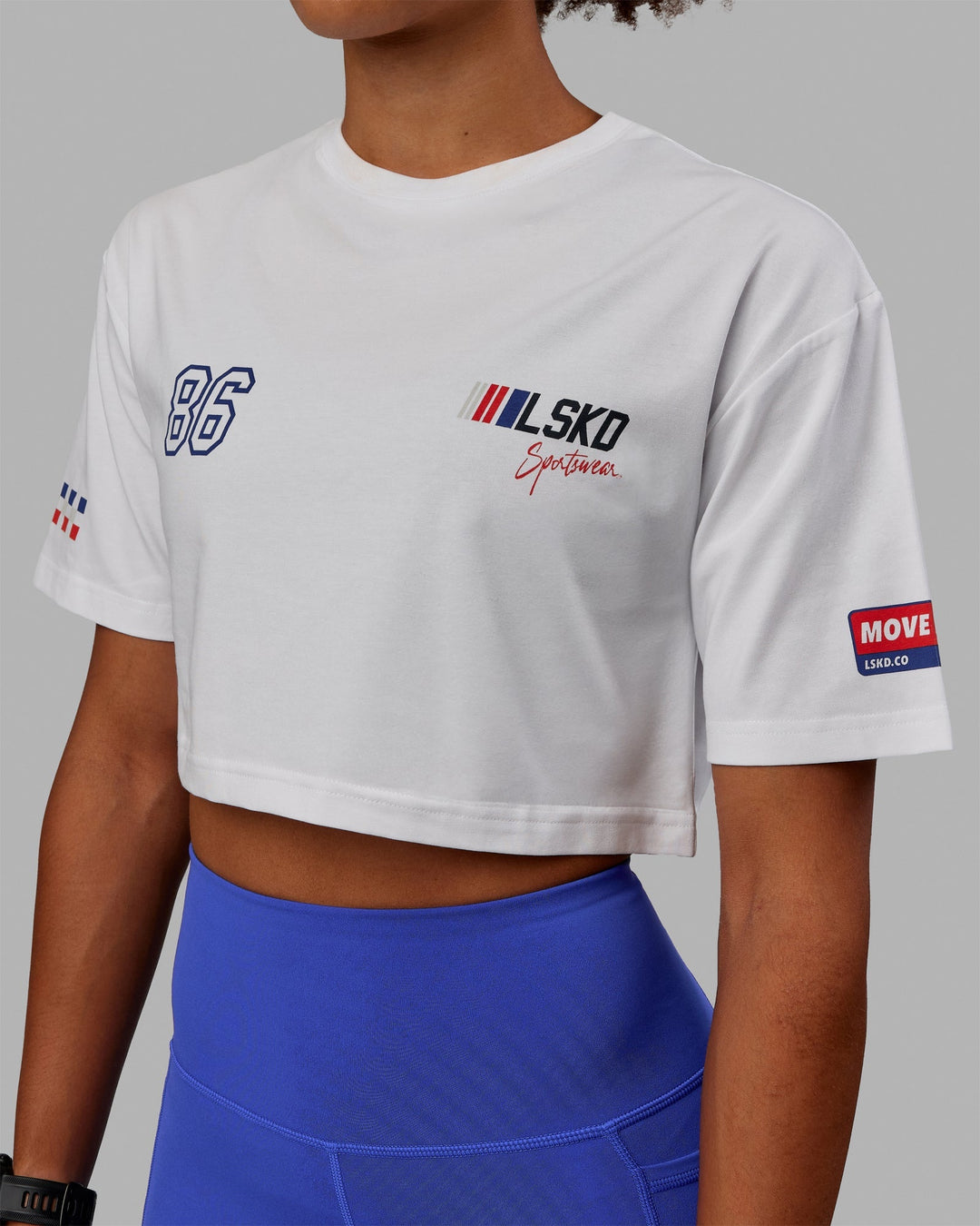 Woman wearing Redline FLXCotton Cropped Tee - White-Navy  Edit alt text