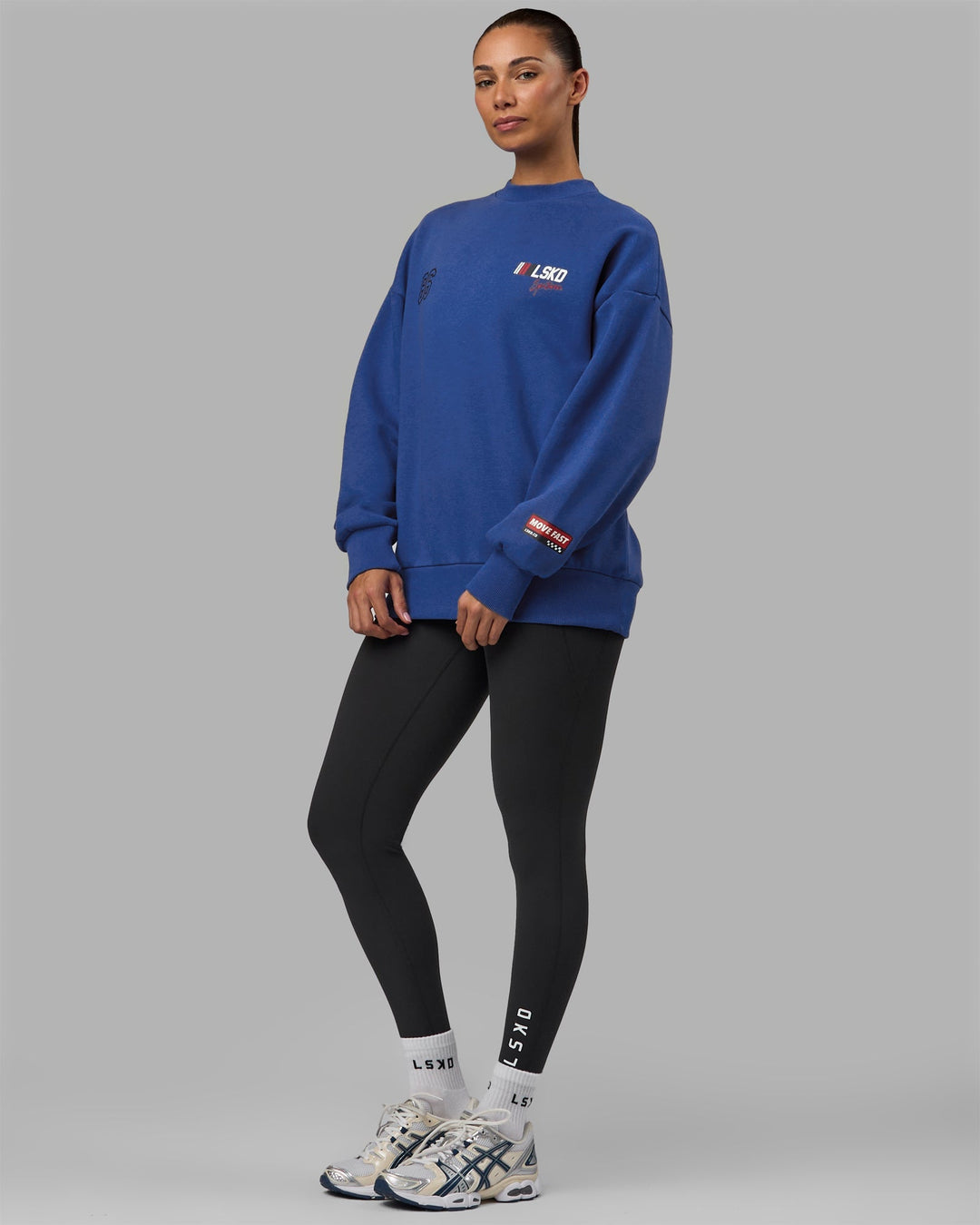 Woman wearing Unisex Redline Sweater Oversize - Power Cobalt-White