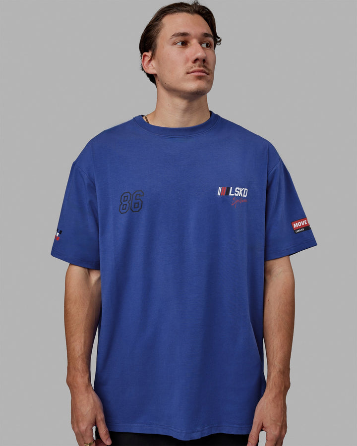 Man wearing Unisex Redline FLXCotton Tee Oversize - Power Cobalt-White
