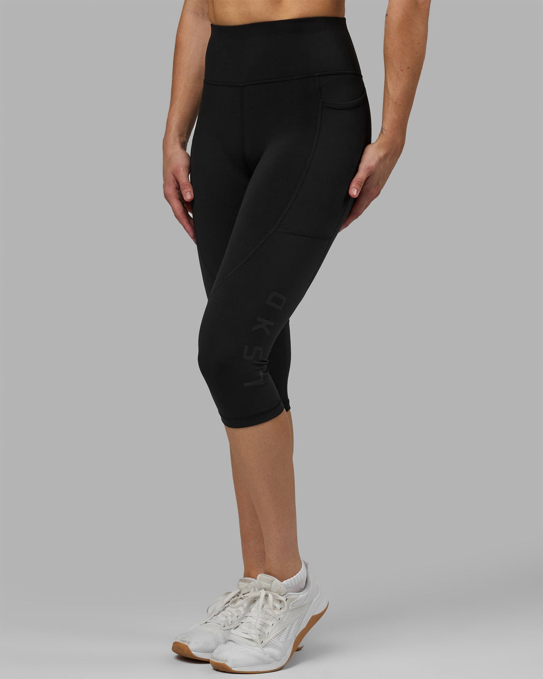 Woman wearing Rep 3/4 Length Leggings - Black-Black