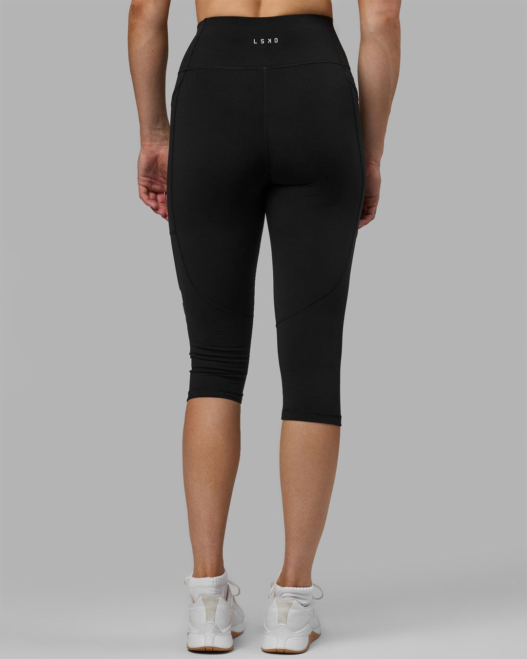 Woman wearing Rep 3/4 Length Leggings - Black-White