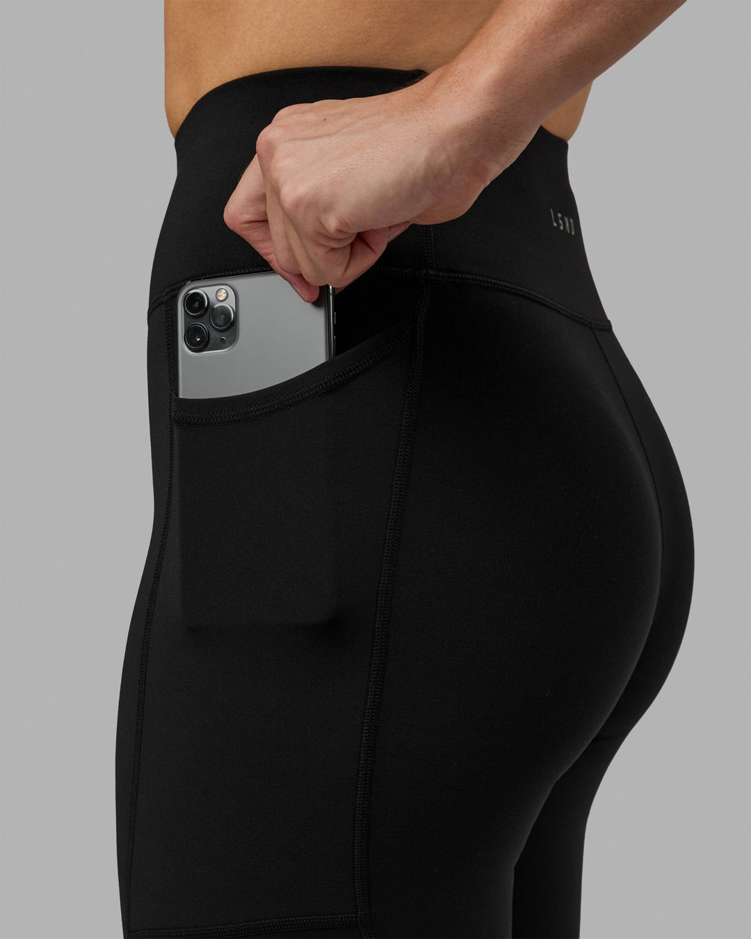 Woman wearing Rep 3/4 Length Leggings - Black-White