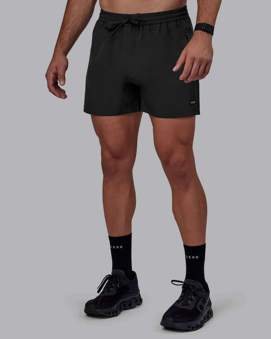 Man wearing Rep 5&quot; Lined Performance Shorts - Pirate Black