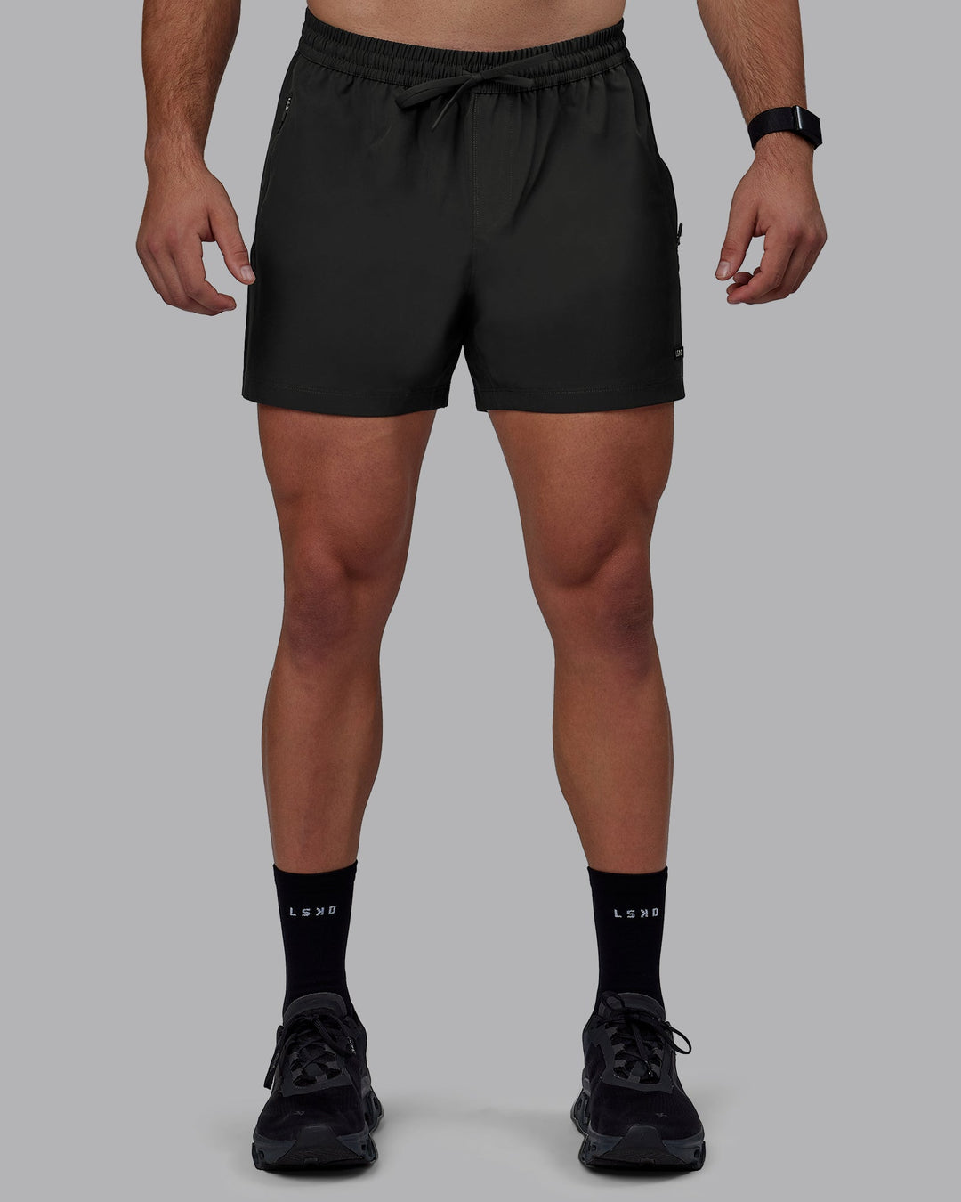 Man wearing Rep 5&quot; Lined Performance Shorts - Pirate Black