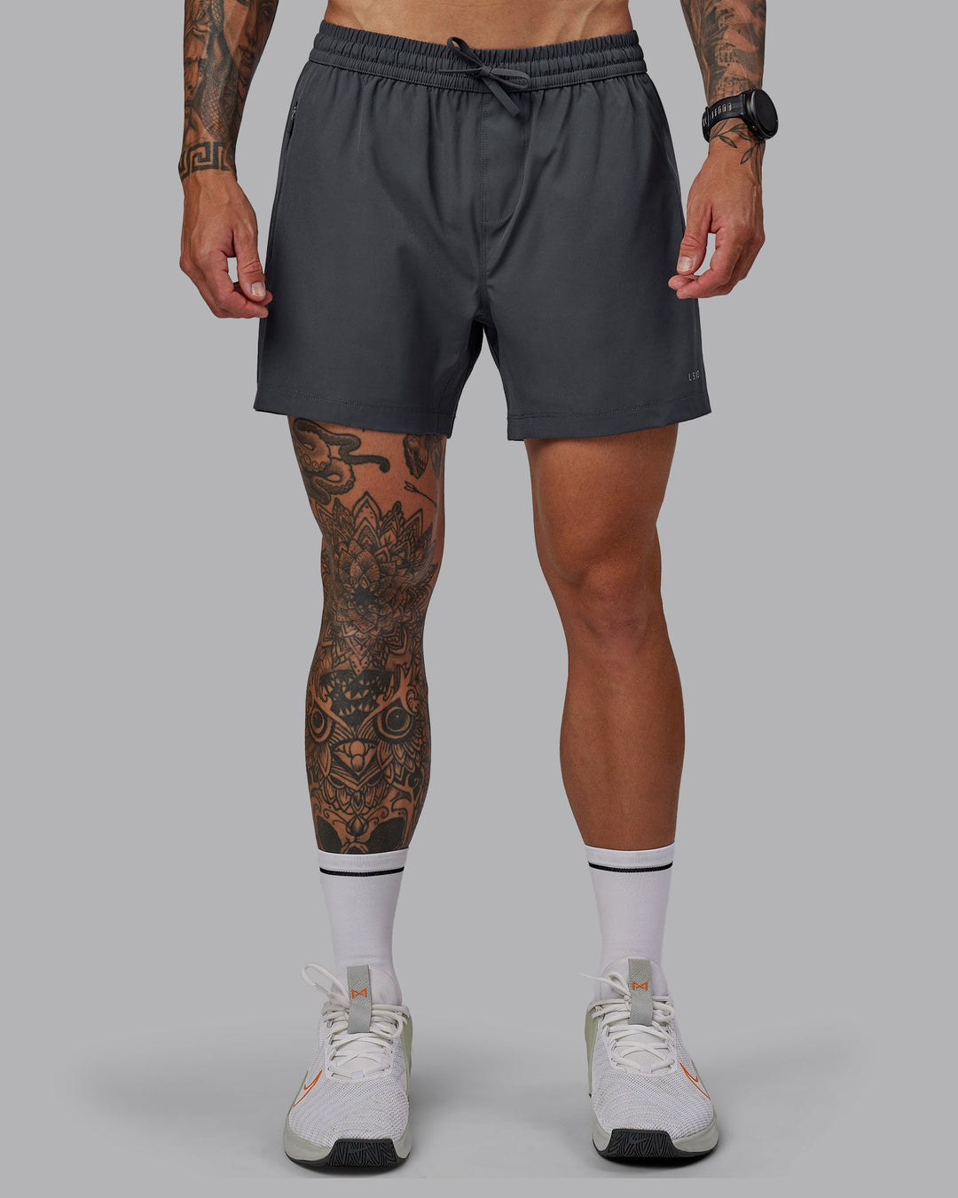 Man wearing Rep 5&quot; Lined Performance Shorts - Dark Storm