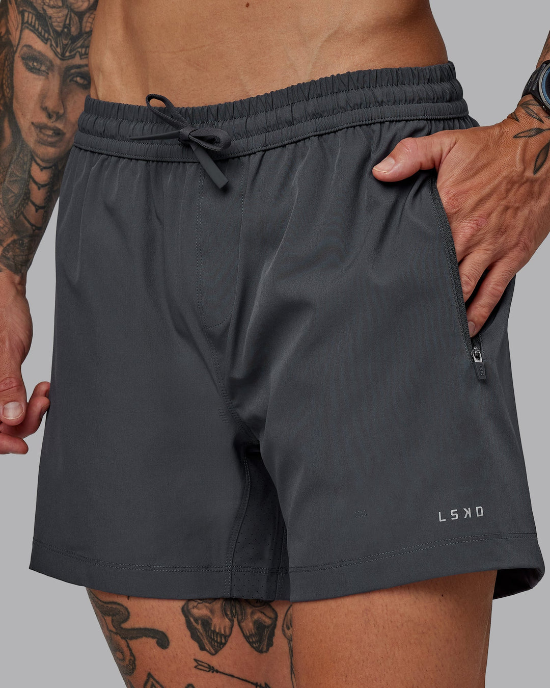 Man wearing Rep 5&quot; Lined Performance Shorts - Dark Storm