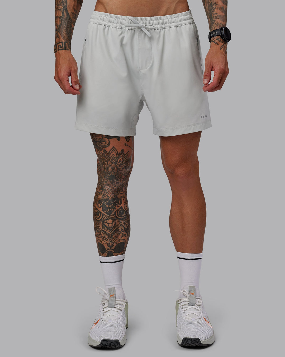 Man wearing Rep 5&quot; Lined Performance Shorts - Digital Mist