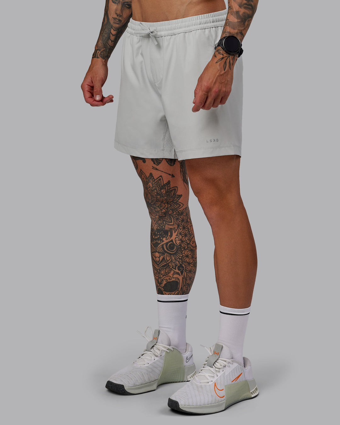 Man wearing Rep 5&quot; Lined Performance Shorts - Digital Mist