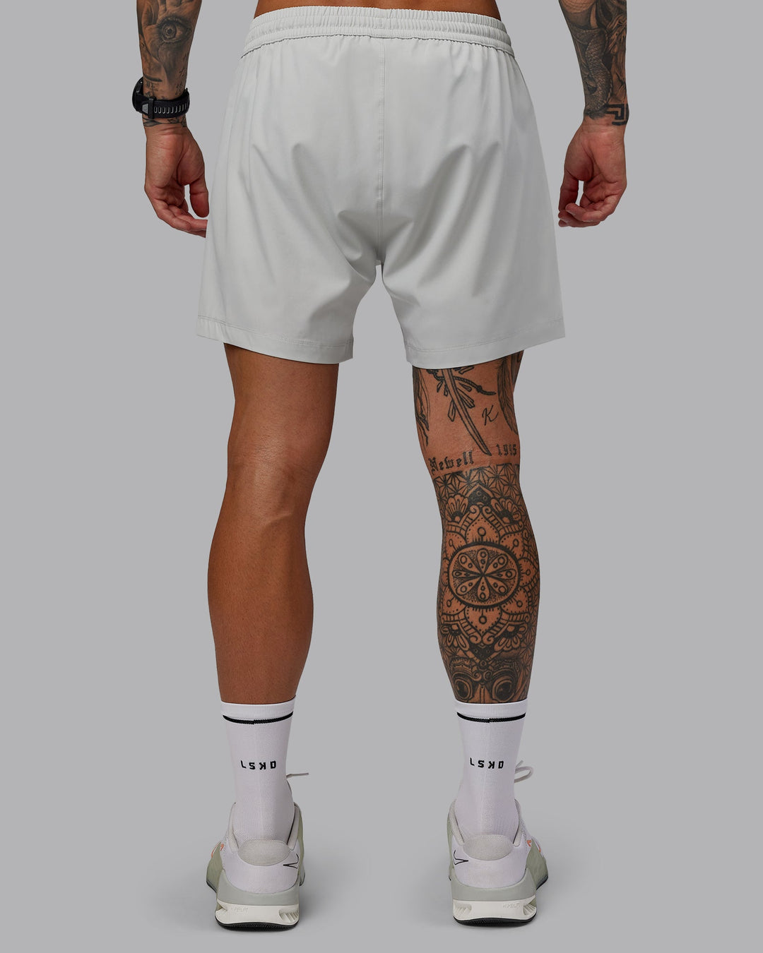 Man wearing Rep 5&quot; Lined Performance Shorts - Digital Mist