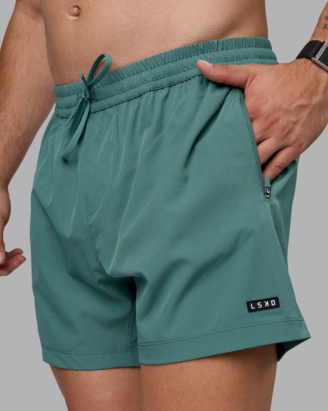 Man wearing Rep 5&quot; Lined Performance Shorts - Sagebrush