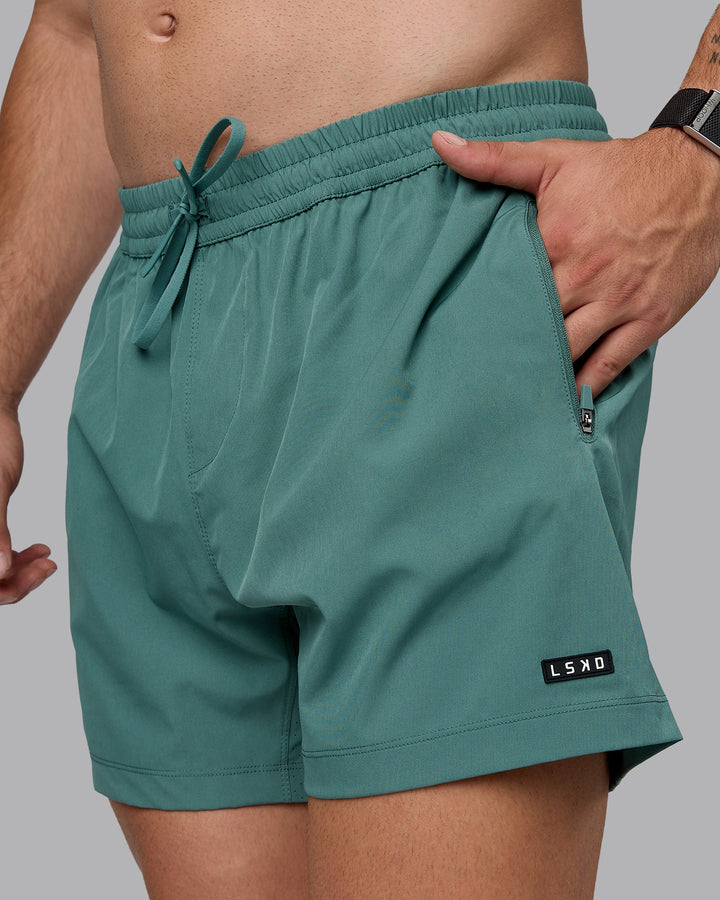 Man wearing Rep 5&quot; Lined Performance Shorts - Sagebrush
