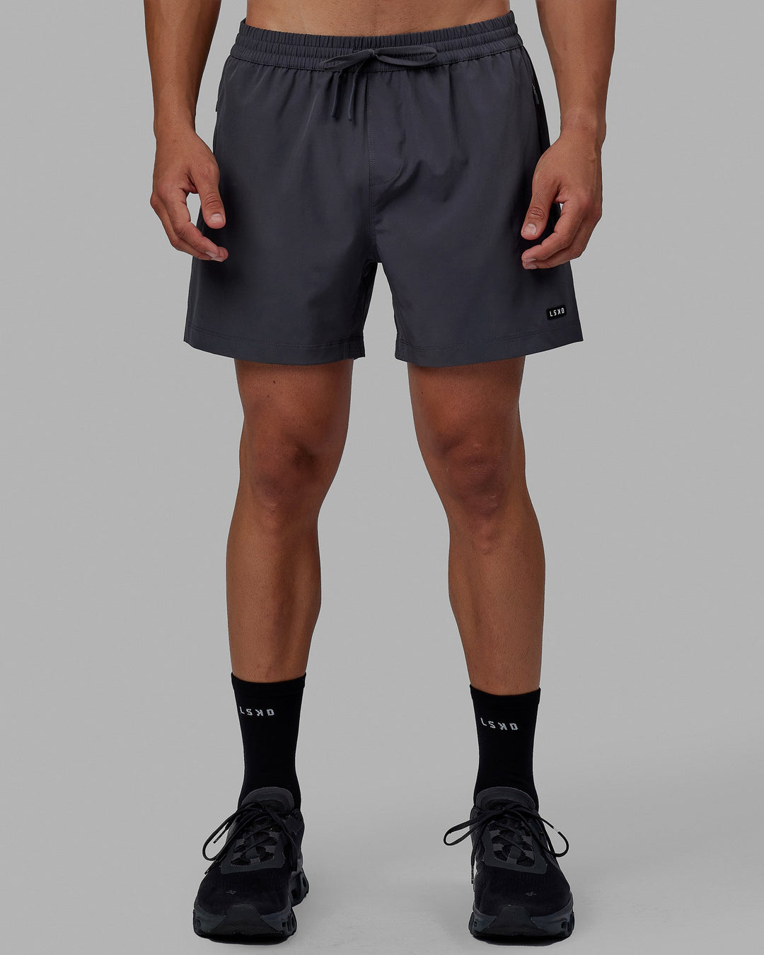 Man wearing Rep 5'' Performance Short - Asphalt