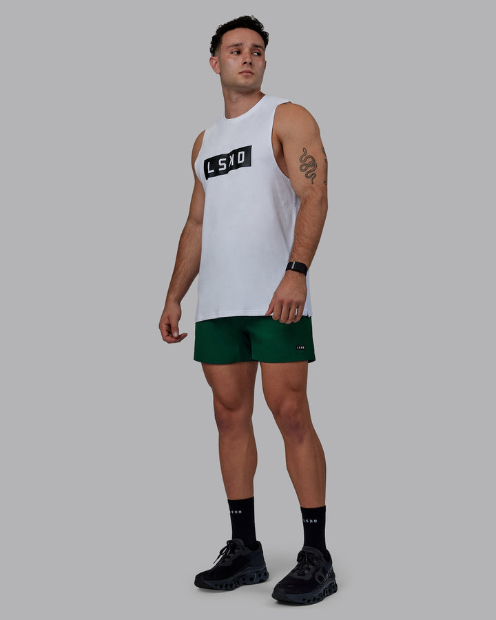 Man wearing Rep 5&quot; Performance Shorts - Deep Emerald
