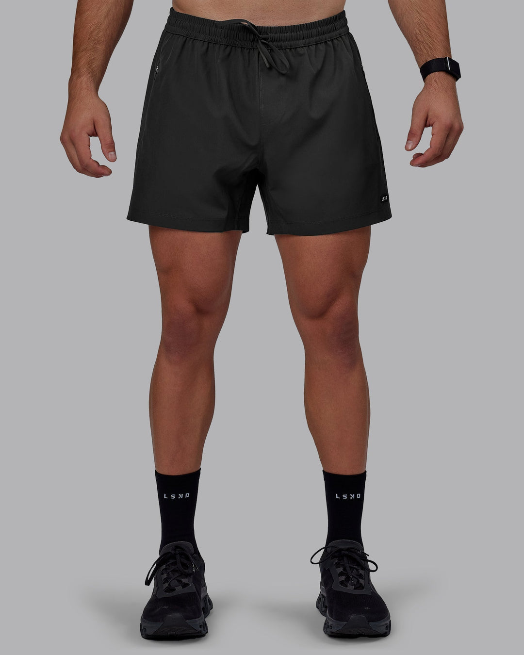 Man wearing Rep 5" Performance Shorts - Pirate Black