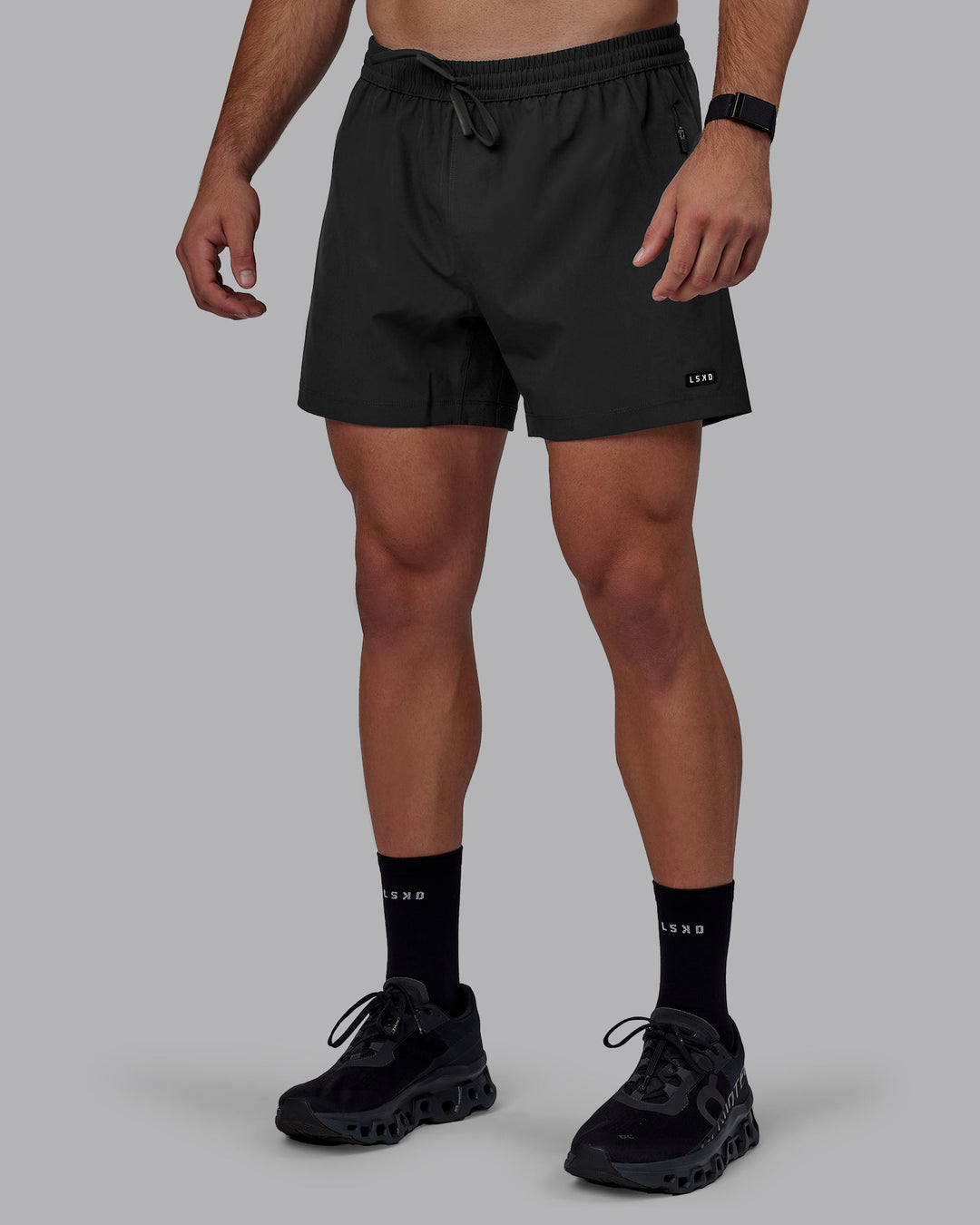 Man wearing Rep 5&quot; Performance Shorts - Pirate Black