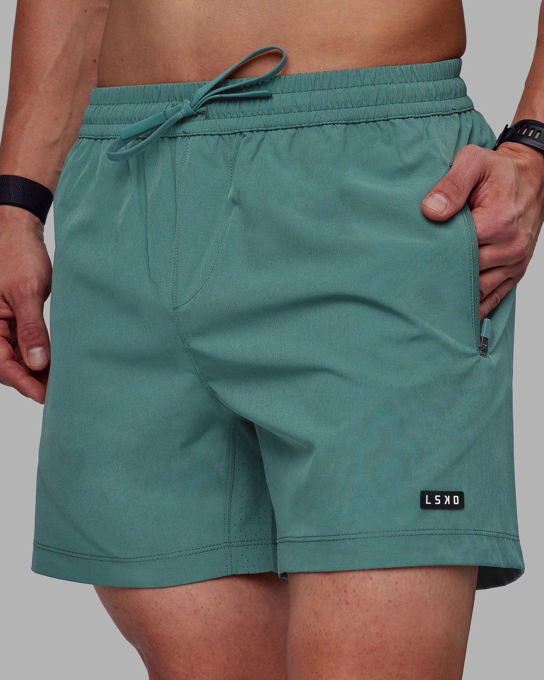 Man wearing Rep 5&quot; Performance Shorts - Sage Bush