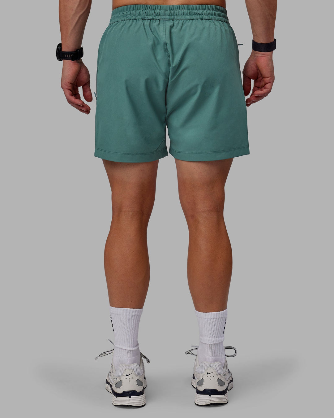 Man wearing Rep 5&quot; Performance Shorts - Sage Bush