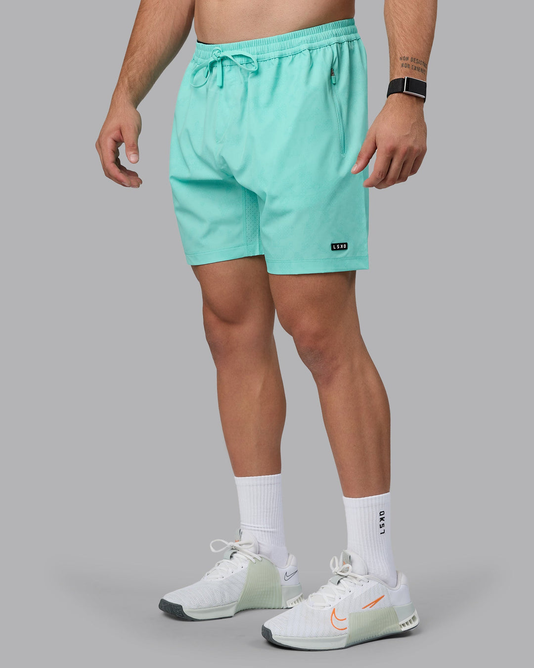 Man wearing Rep 7&quot; Performance Shorts - Digital Camo Cockatoo