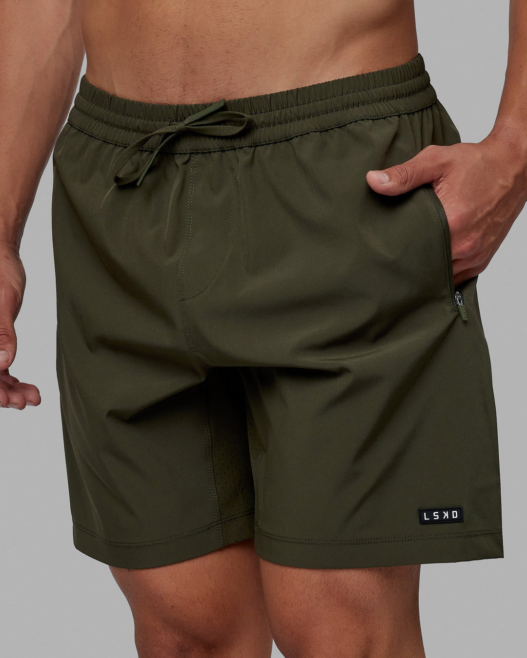 Man wearing Rep 7'' Performance Short - Forest Night