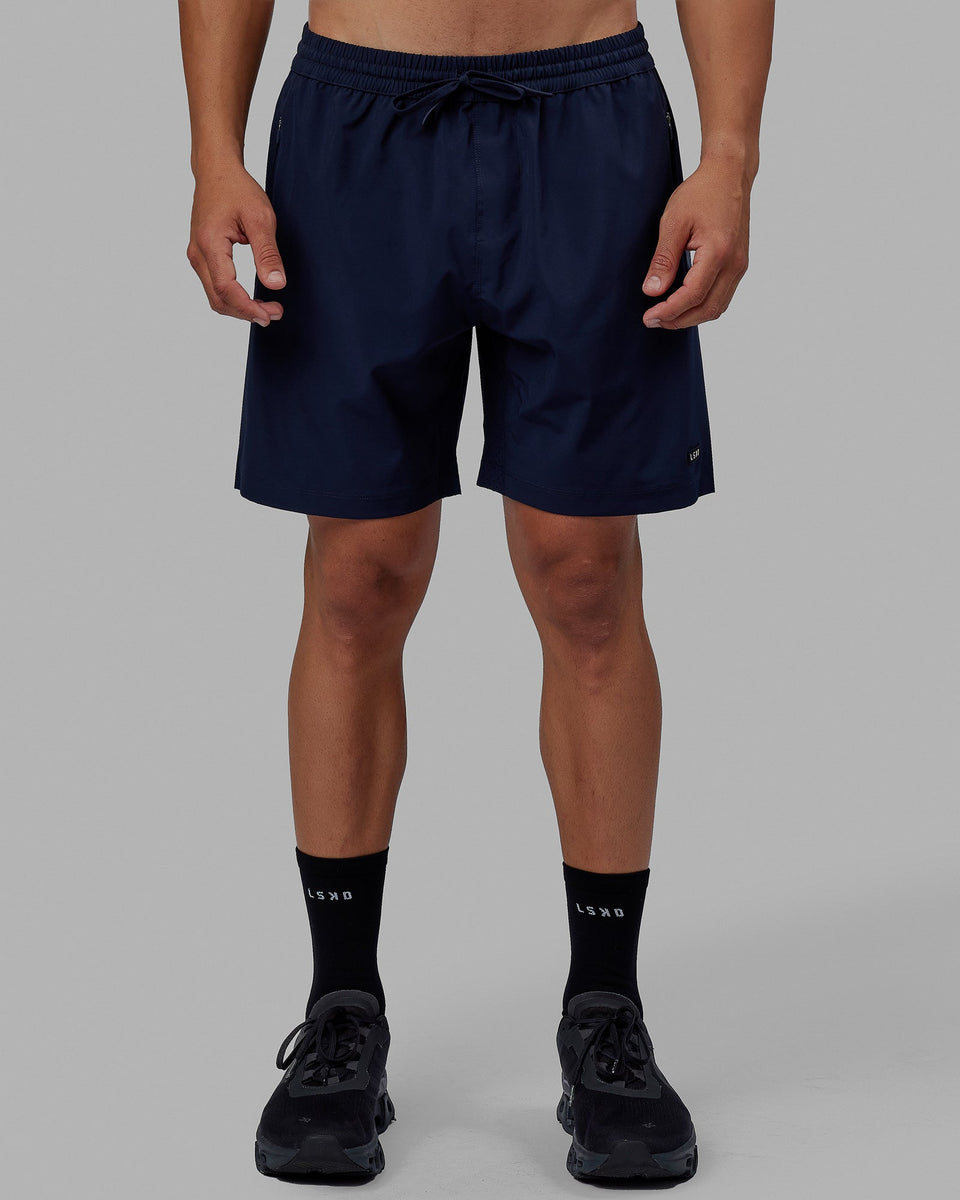 Man wearing Rep 7'' Performance Short - Navy