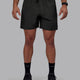 Man wearing Rep 7" Performance Shorts - Pirate Black