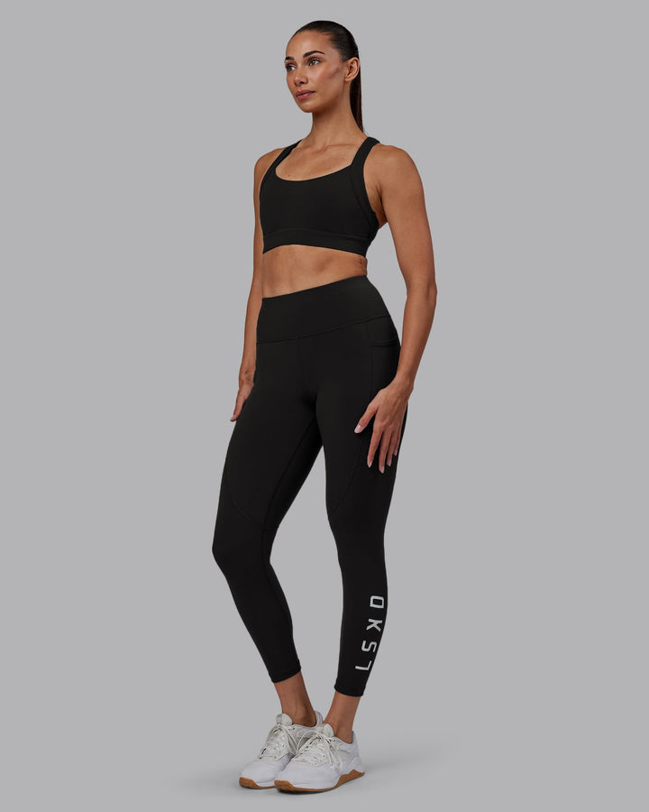 Woman wearing Rep 7/8 Length Leggings - Pirate Black-White
