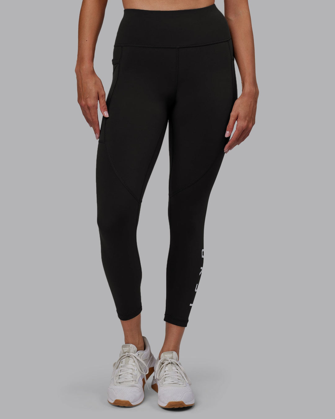 Woman wearing Rep 7/8 Length Leggings - Pirate Black-White