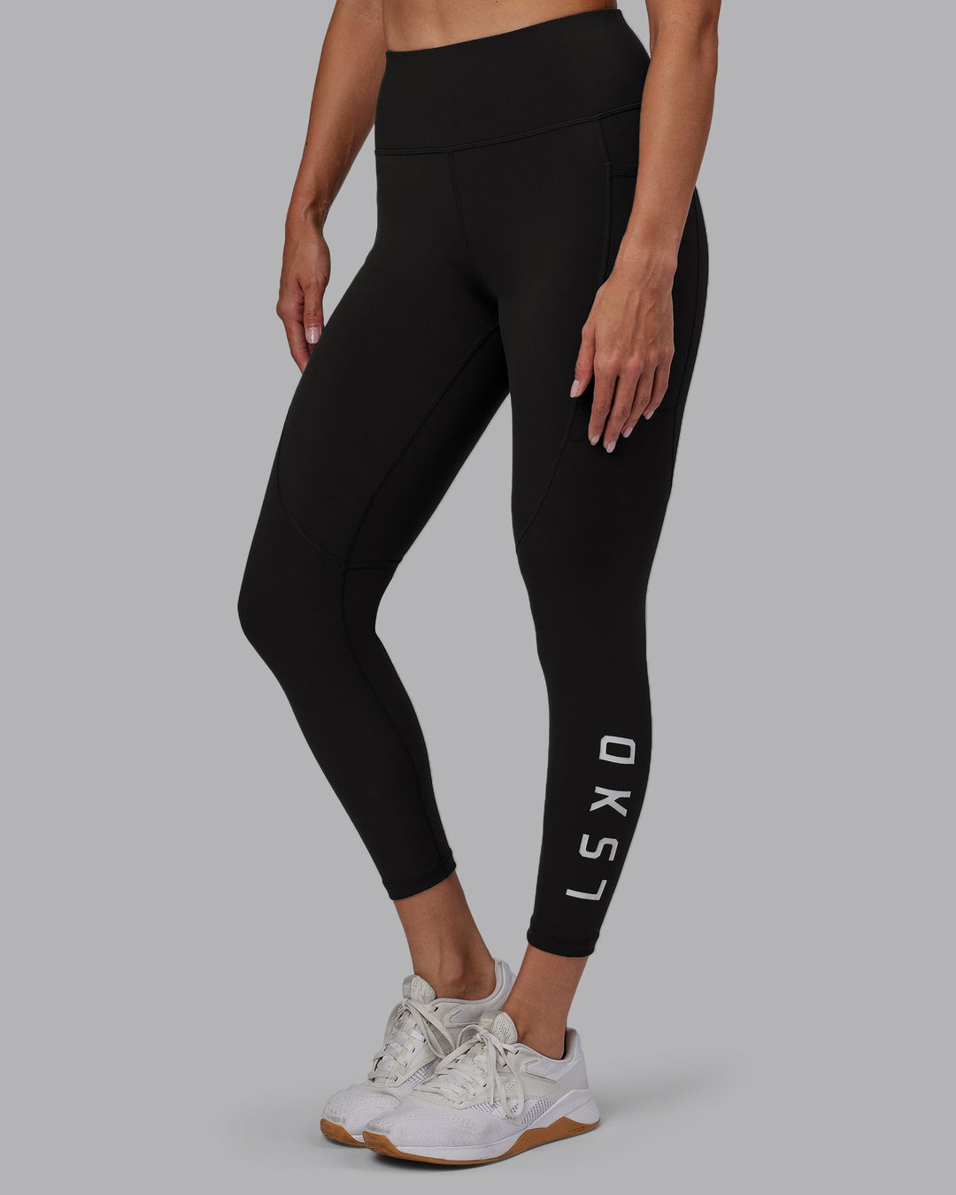 Woman wearing Rep 7/8 Length Leggings - Pirate Black-White