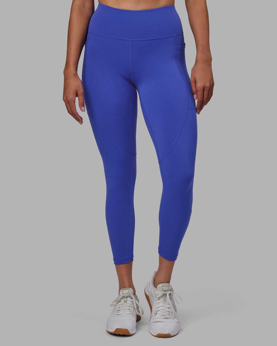 Woman wearing Rep 7/8 Length Leggings - Power Cobalt-White