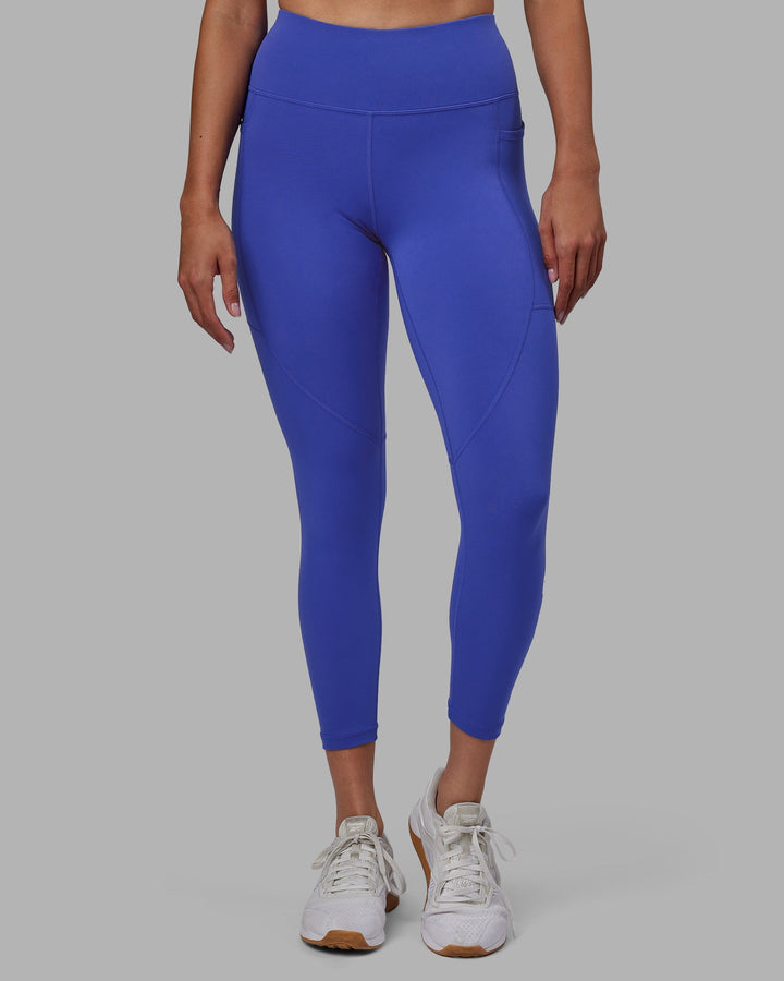 Woman wearing Rep 7/8 Length Leggings - Power Cobalt-White
