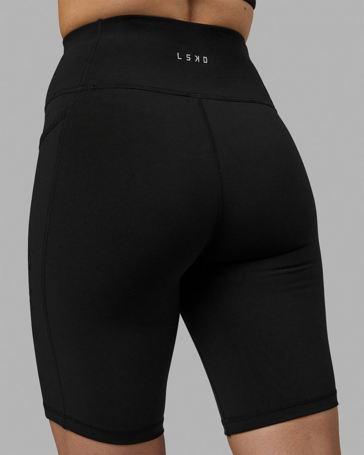 Woman wearing Rep Bike Shorts - Black-Black
