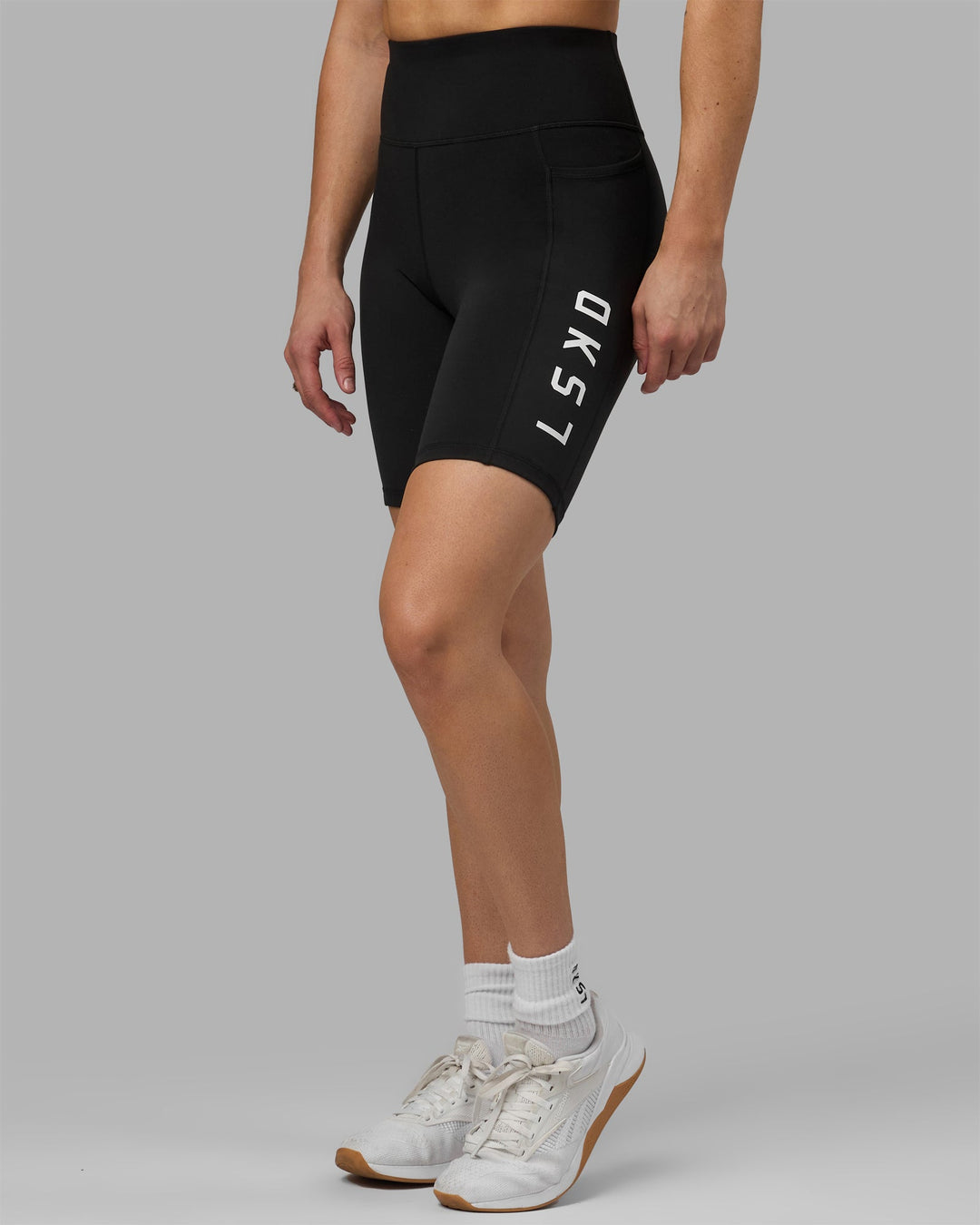 Woman wearing Rep Bike Shorts - Black-White