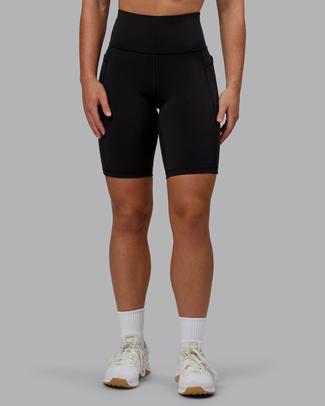 Woman wearing Rep Bike Shorts - Black-Bubblegum