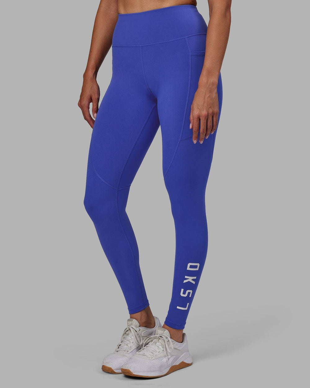 Woman wearing Rep Full Length Leggings - Power Cobalt-White