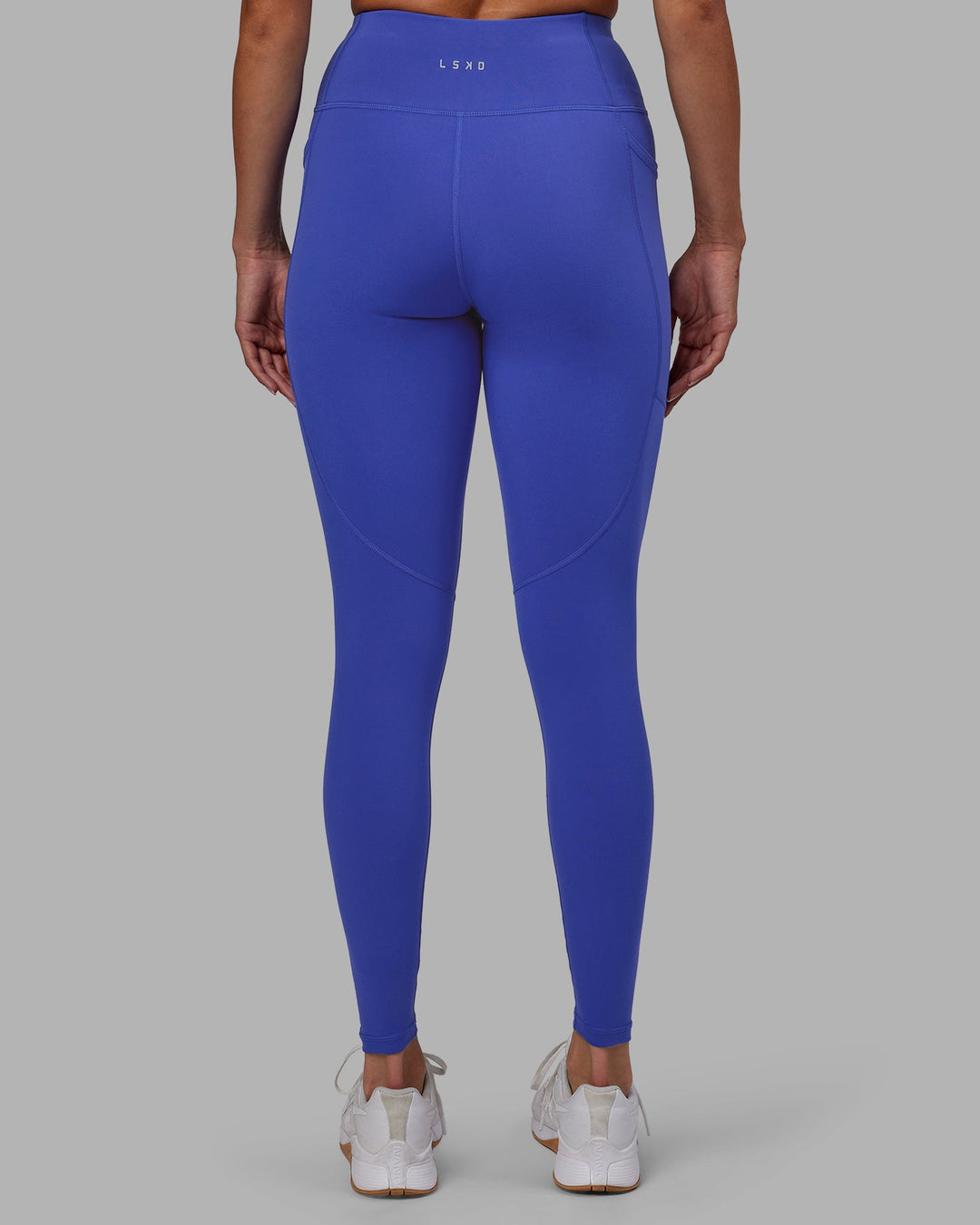 Woman wearing Rep Full Length Leggings - Power Cobalt-White