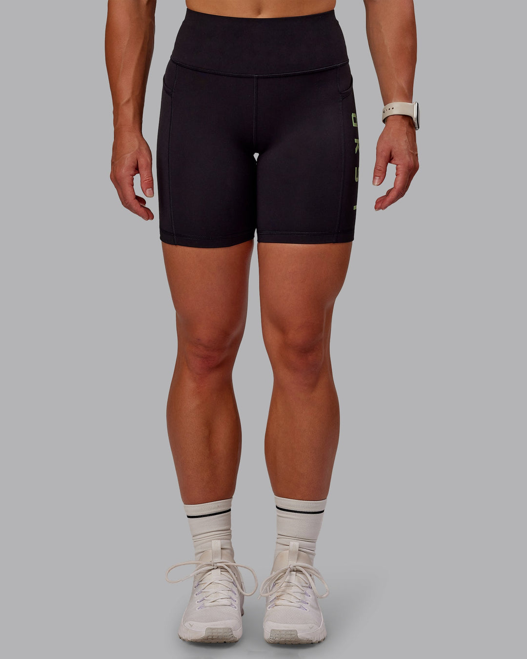 Woman wearing Rep Ultra High-Rise 6&quot; Short Pockets - Black-Surreal Green